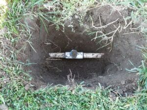 old sprinkler tee small