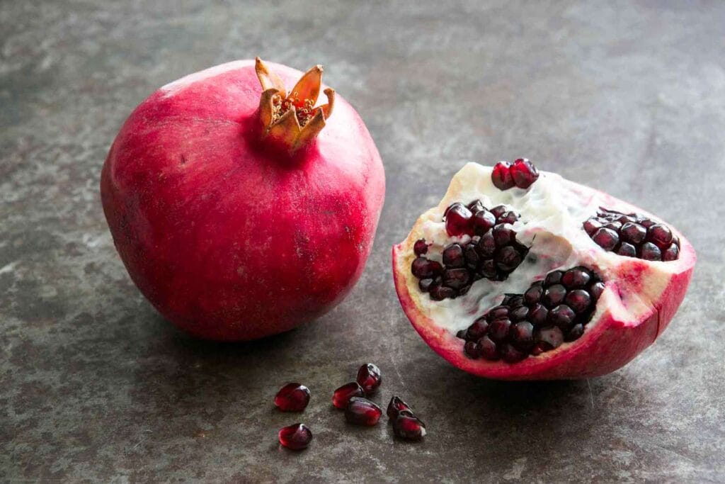 opt aboutcom coeus resources content migration simply recipes uploads 2013 11 how to cut pomegranate horiz a 1800 81c587bf93ab48bfb9ea7afea4d76c4c