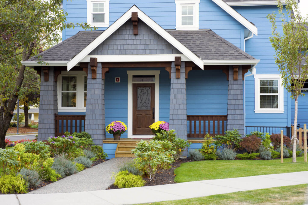 modern blue home with curb appeal