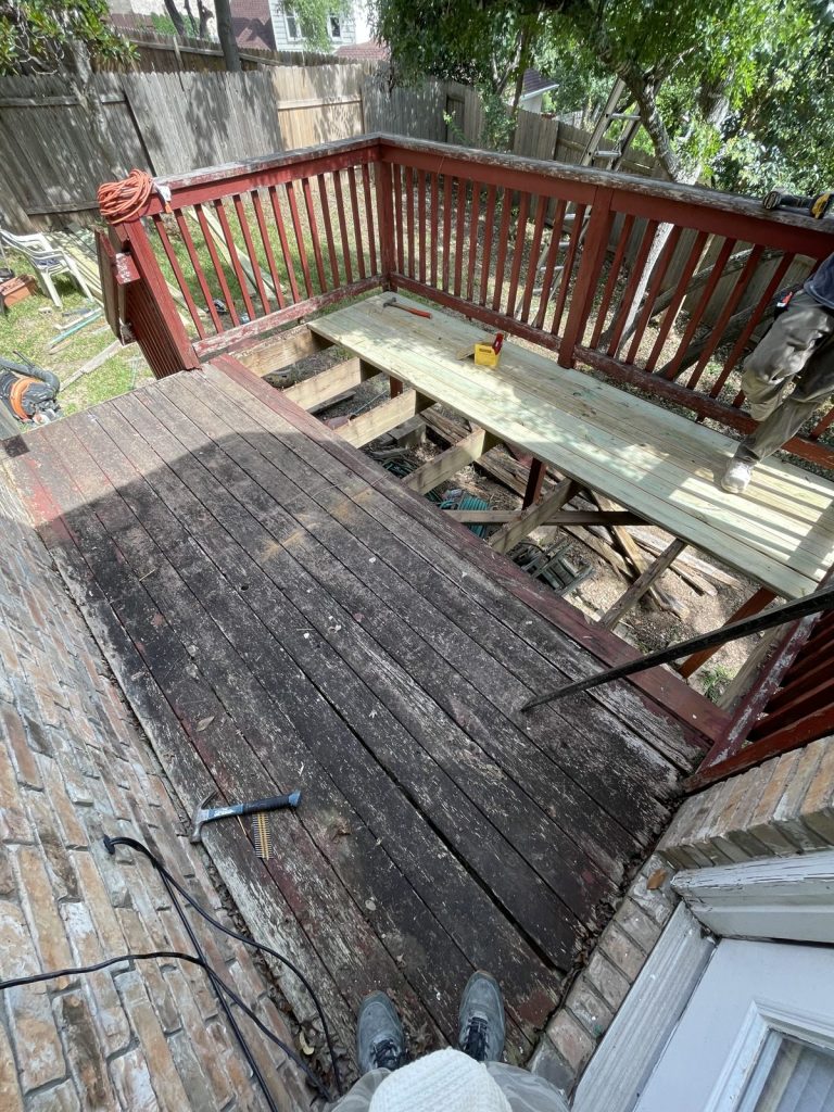 Recent Landscaping Projects In Austin, Tx 1 weathered gray deck boards before the deck restoration, austin tx